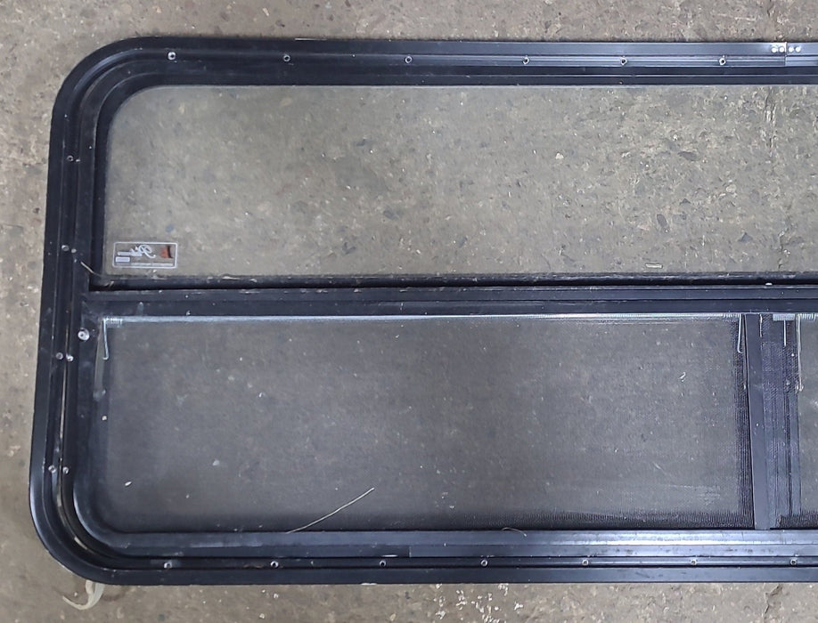 Used Black Radius Opening Window : 59 1/2" W x 21 1/4" H x 1 1/2" D