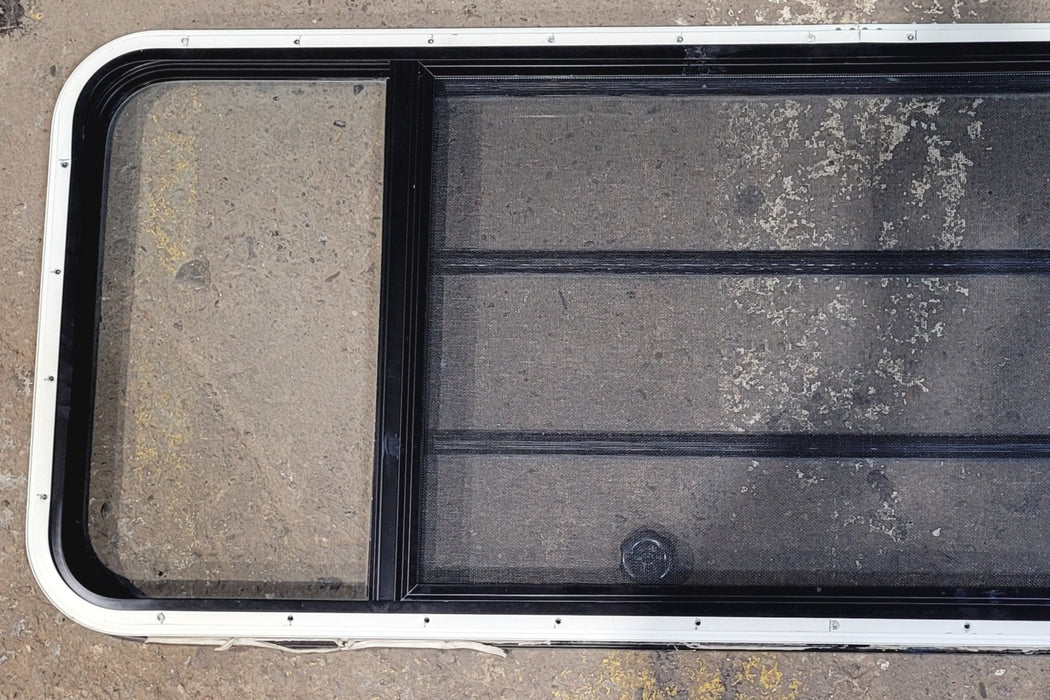 Used Black Radius Opening Window : 59 1/2" W x 21 3/4" H x 1 1/4" D