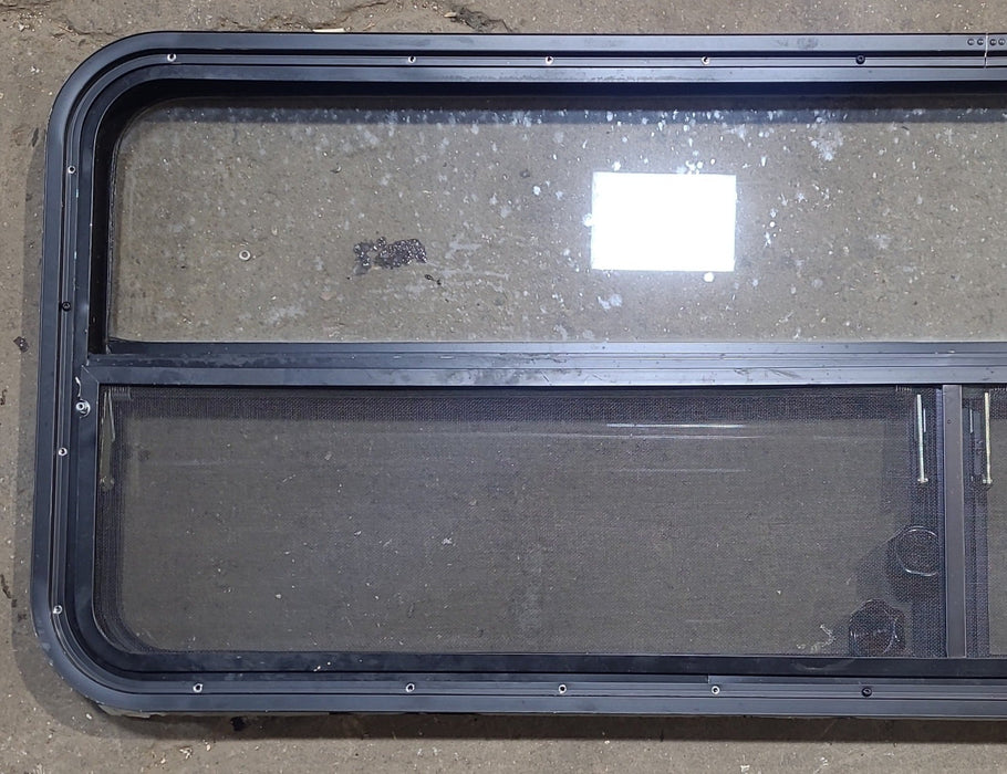 Used Black Radius Opening Window : 59 1/4" W x 21 1/4" H x 1 7/8" D