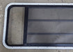 Used Black Radius Opening Window : 59 3/8" W x 21 3/8" H x 1 3/4" D - Young Farts RV Parts