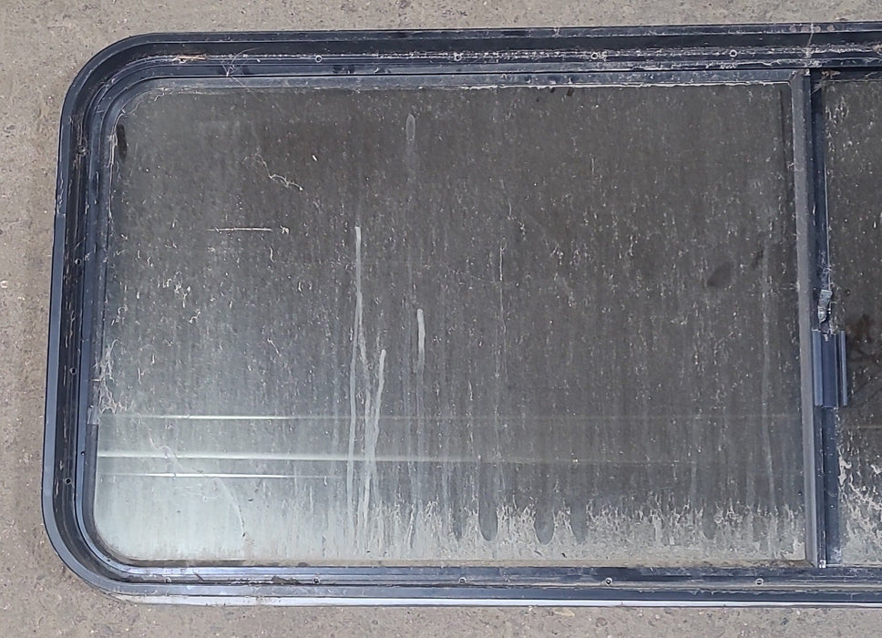 Used Black Radius Opening Window : 60 1/2" W x 21 3/4" H x 2" D