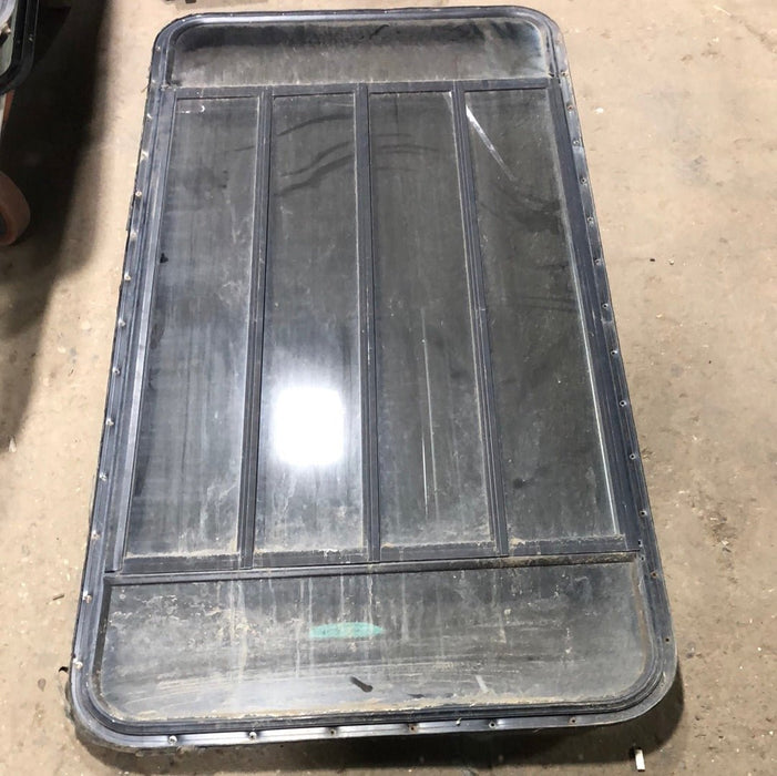 Used Black  Radius Opening Window : 60" X 30 1/2" X 1 3/4" D