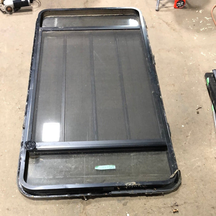 Used Black  Radius Opening Window : 60" X 30 1/2" X 1 3/4" D