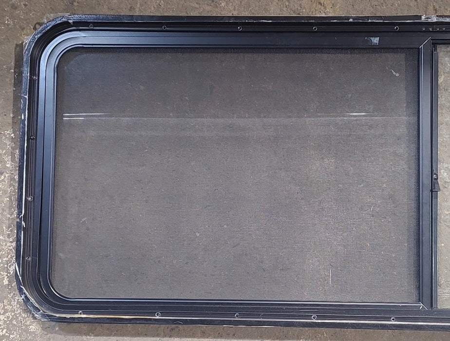 Used Black Radius Opening Window : 60 1/4" W x 21 3/4" H x 1 3/4" D - Young Farts RV Parts