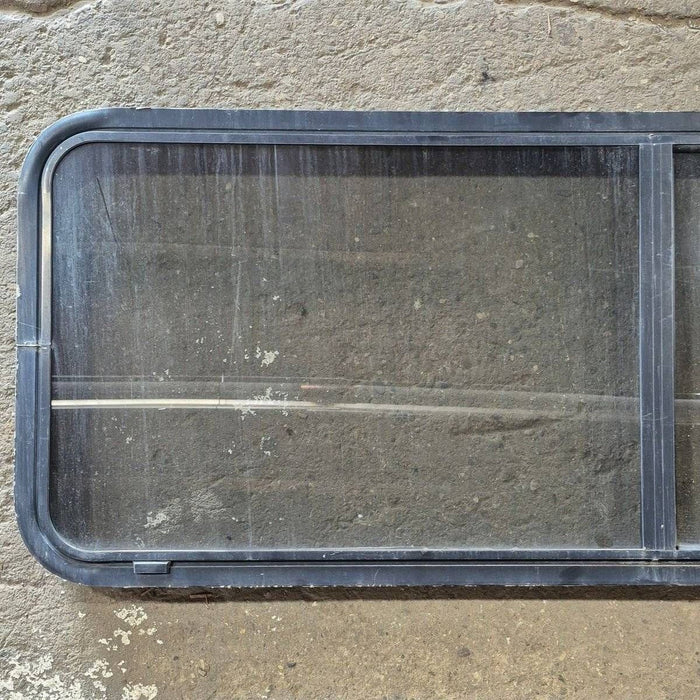 Used Black Radius Opening Window - 60 X 23 1/2 X 2