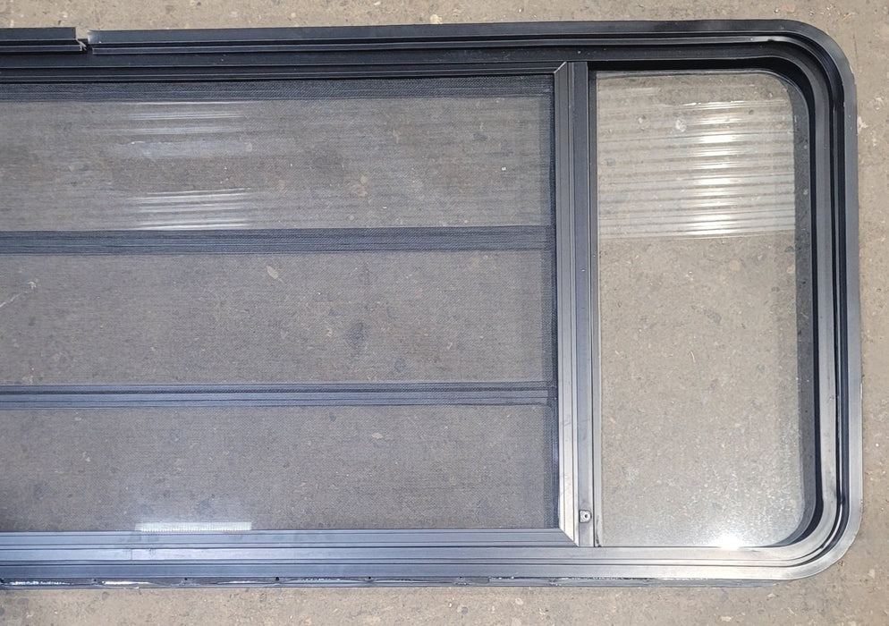 Used Black Radius Opening Window : 61 3/4" W x 23 3/4" H x 1 3/4" D - Young Farts RV Parts