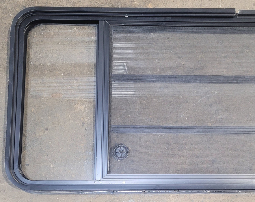 Used Black Radius Opening Window : 61 3/4" W x 23 3/4" H x 1 3/4" D - Young Farts RV Parts