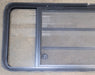 Used Black Radius Opening Window : 61 3/4" W x 23 3/4" H x 1 3/4" D - Young Farts RV Parts