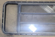 Used Black Radius Opening Window : 61 3/4" W x 23 3/4" H x 1 3/4" D - Young Farts RV Parts