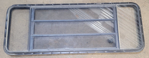 Used Black Radius Opening Window : 61 3/4" W x 23 3/4" H x 1 3/4" D - Young Farts RV Parts