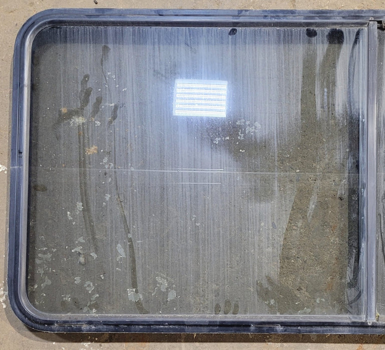 Used Black Radius Opening Window : 64 1/4" W x 28 3/4" H x 1 3/4" - Young Farts RV Parts