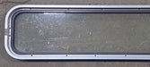 Used Brown Radius Non Opening Window : 47" W x 10 3/4" H x 1 5/8" D - Young Farts RV Parts