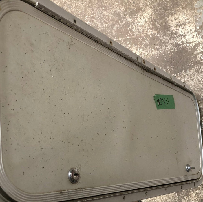 Used Radius Cargo / compartment Door 10 3/4 x 29 3/4 - Young Farts RV Parts