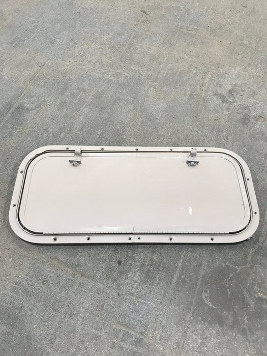 Used Radius Cargo / compartment Door 23 3/4" W x 9 3/4" H