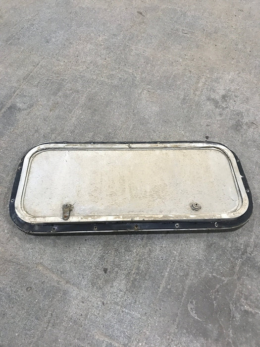 Used Radius Cargo / compartment Door 23 3/4" W x 9 3/4" H