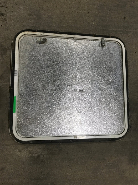 Used Radius Corner cargo door  23 3/4" W  x 21 3/4" H x  1/2" D