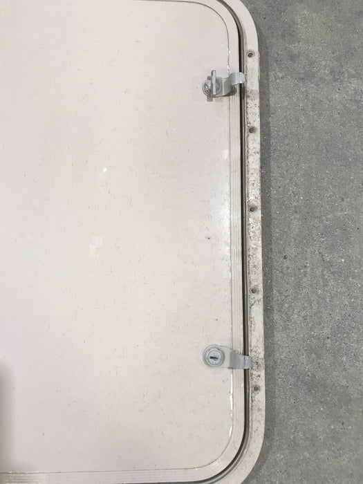 Used Radius Corner cargo door  23 3/4" W  x 21 3/4" H x  1/2" D