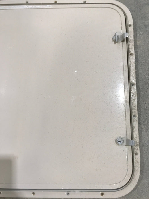 Used Radius Corner cargo door  23 3/4" W  x 21 3/4" H x  1/2" D