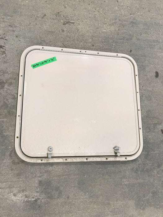 Used Radius Corner cargo door  23 3/4" W  x 21 3/4" H x  1/2" D