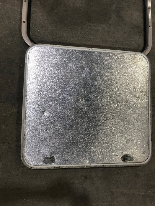 Used Radius Corner cargo door  23 3/4" W  x 21 3/4" H x  1/2" D