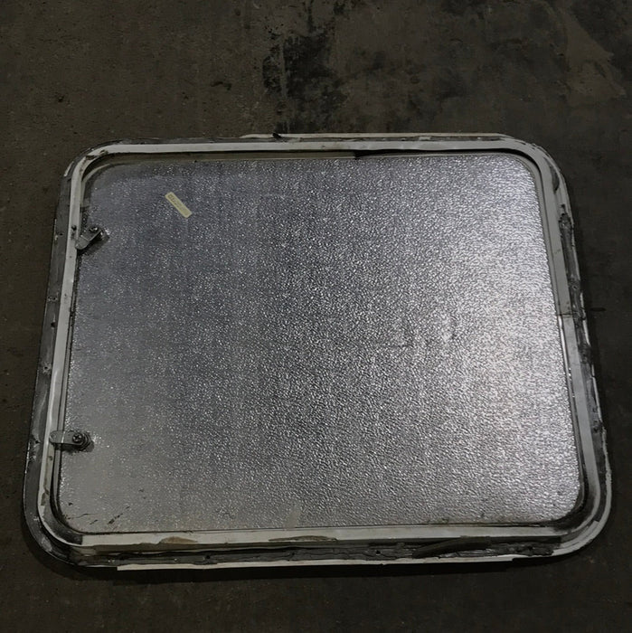 Used Radius corner Propane cargo door 26 3/4" X 22 3/4" X 1/2"D