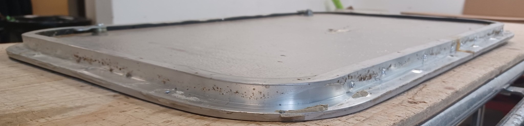 Used Radius Cornered Cargo Door 29 3/4" x 18" x 5/8" - Young Farts RV Parts