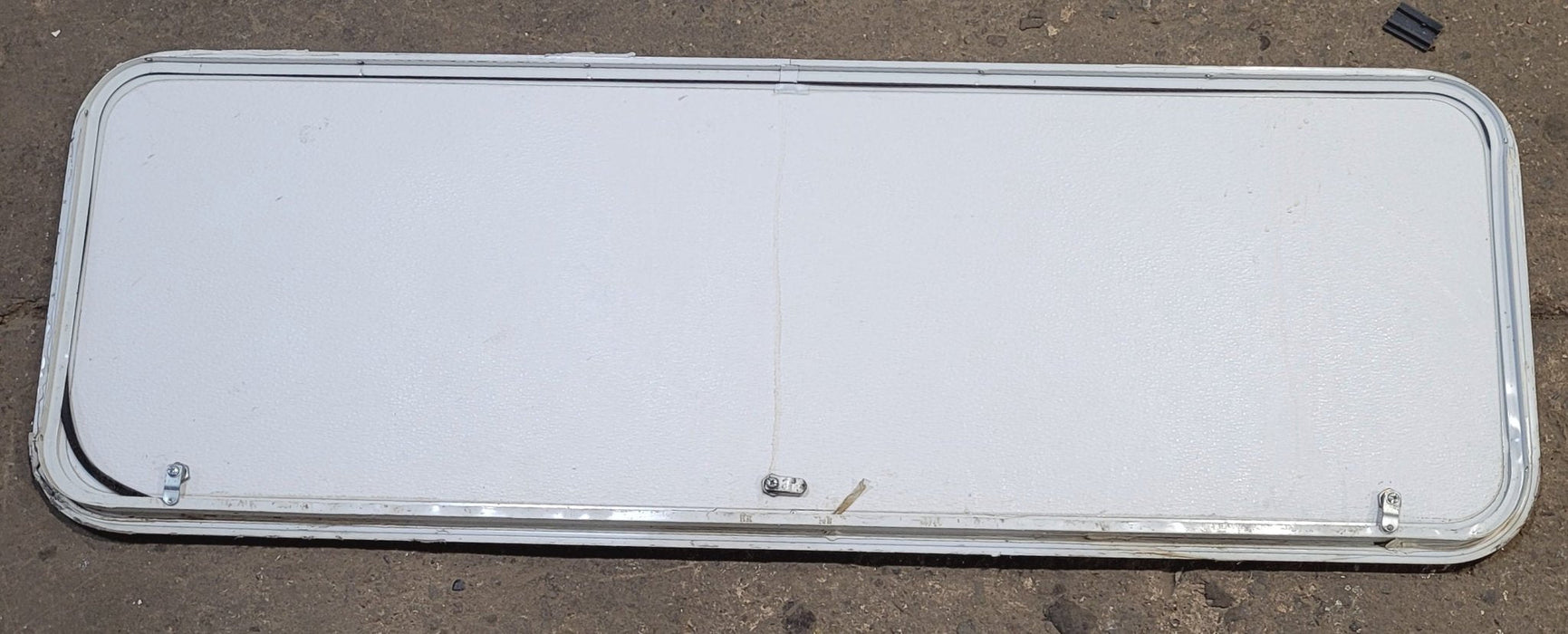 Used Radius Cornered Cargo Door 59 7/8" x 19 7/8" x 1"D - Young Farts RV Parts