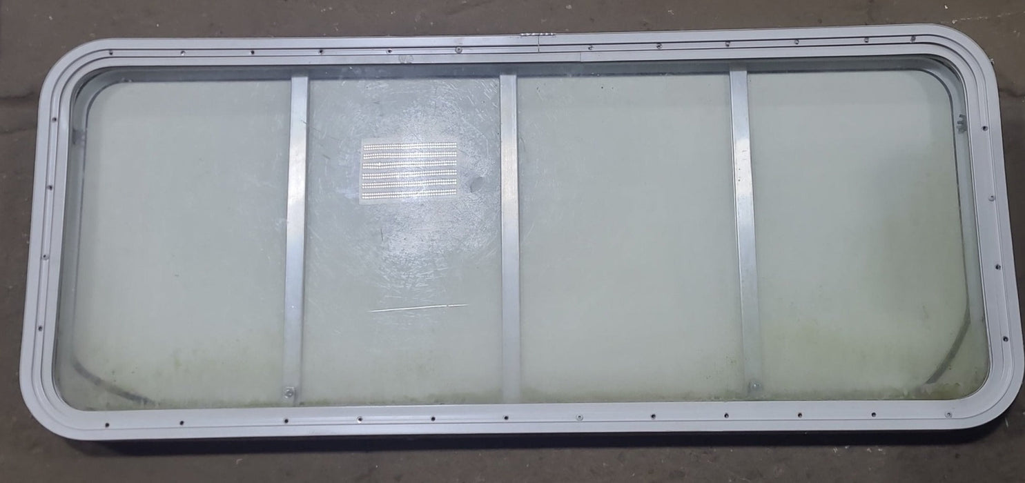 Used Radius Opening Rock Guard Covered Window : 53 1/4" x 21 1/4" X 1 3/4" D