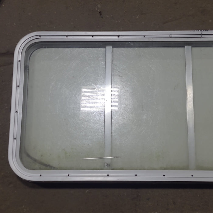 Used Radius Opening Rock Guard Covered Window : 53 1/4" x 21 1/4" X 1 3/4" D