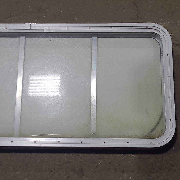 Used Radius Opening Rock Guard Covered Window : 53 1/4" x 21 1/4" X 1 3/4" D