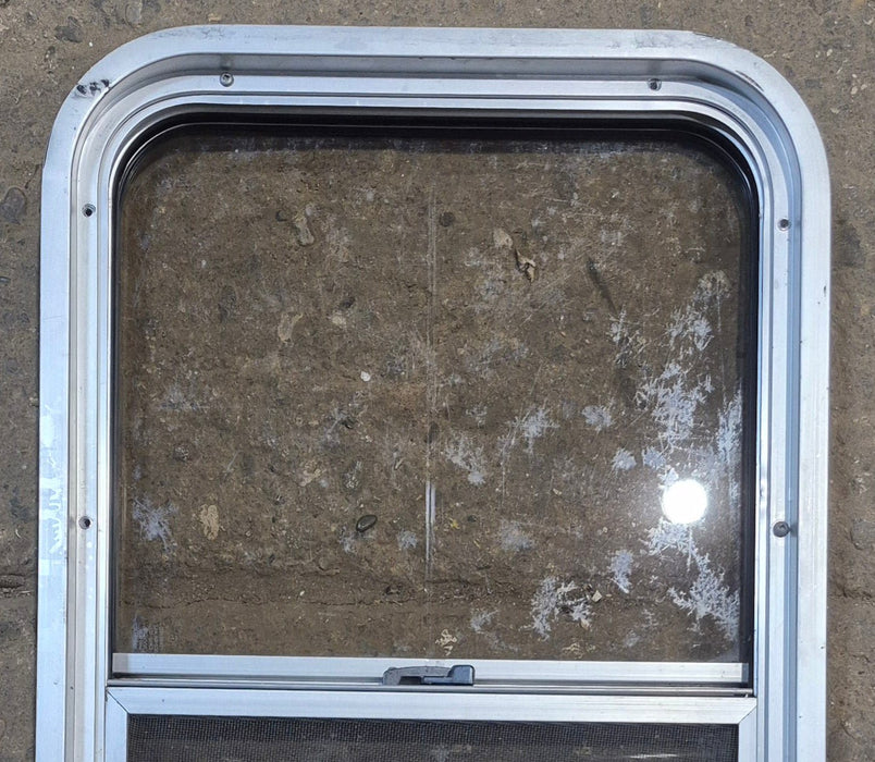 Used Silver Radius Opening Window : 16" W x 27 1/2" H x 1 3/4" D