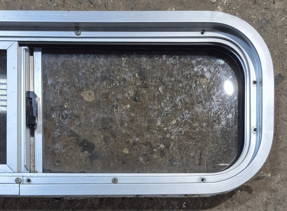 Used Silver Radius Opening Window : 26 1/2" W x 8 1/2" H x 1 3/4" D