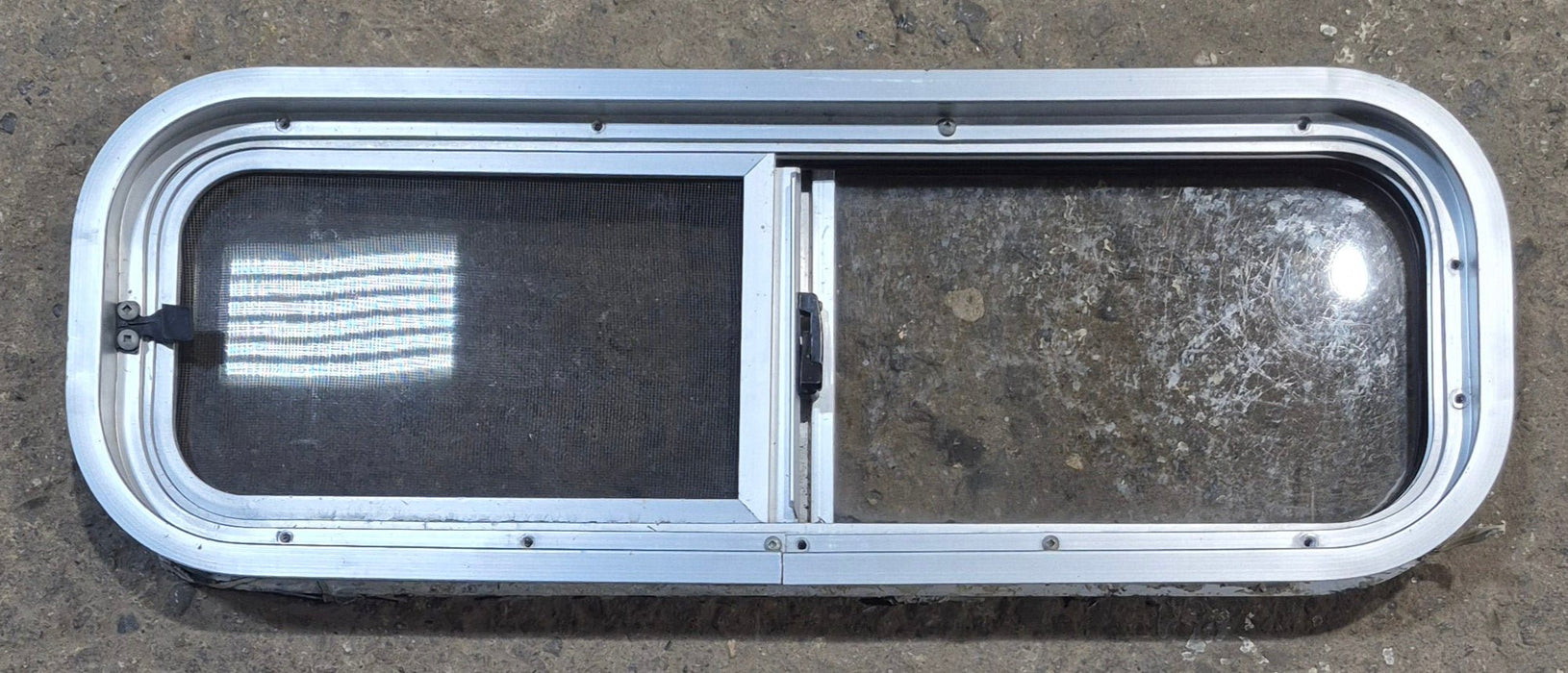Used Silver Radius Opening Window : 26 1/2" W x 8 1/2" H x 1 3/4" D