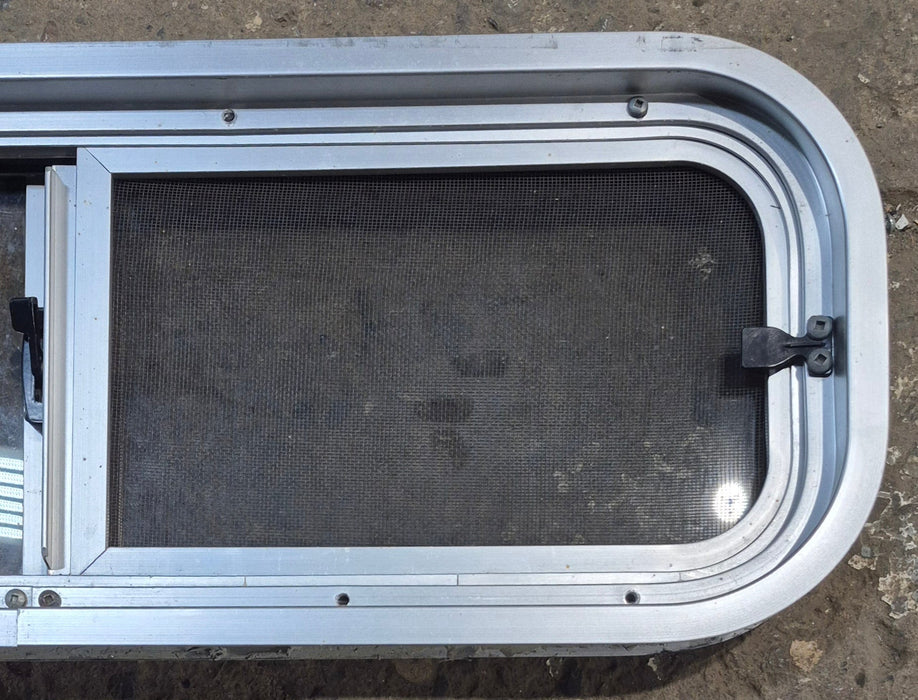 Used Silver Radius Opening Window : 26 1/2" W x 8 1/2" H x 1 3/4" D