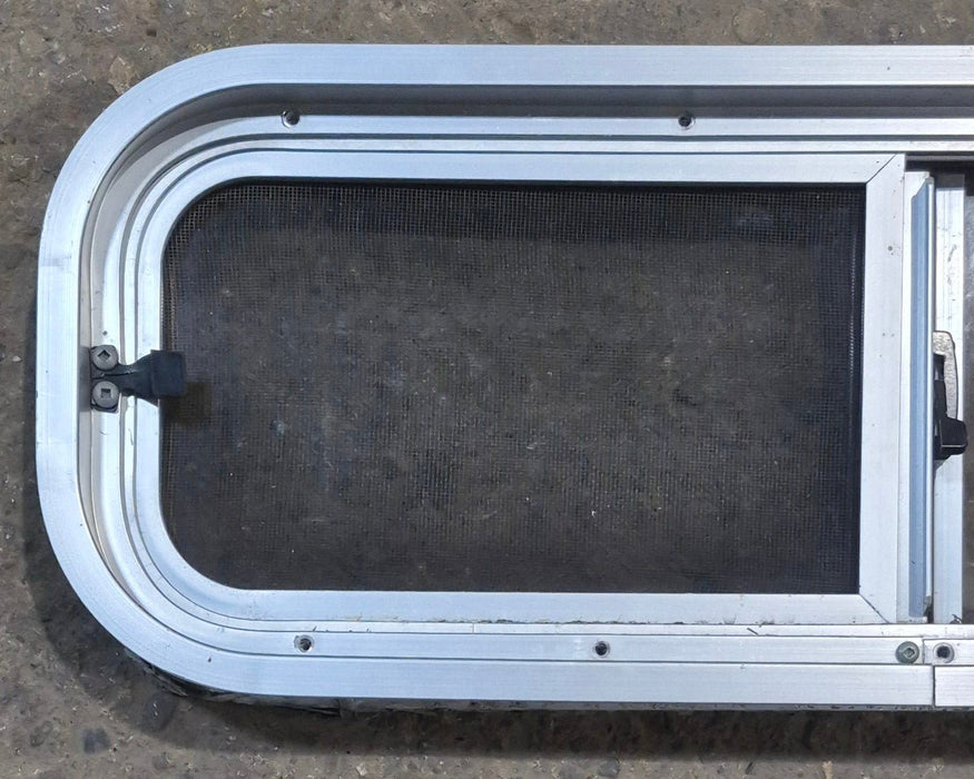 Used Silver Radius Opening Window : 26 1/2" W x 8 1/2" H x 1 3/4" D