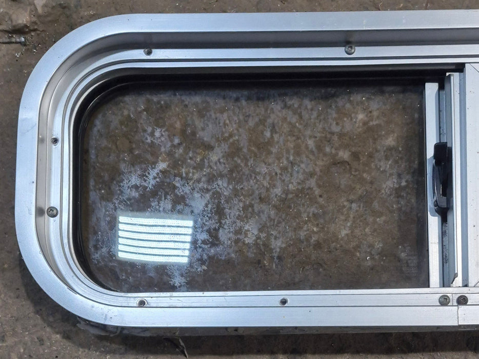 Used Silver Radius Opening Window : 26 1/2" W x 8 1/2" H x 1 3/4" D