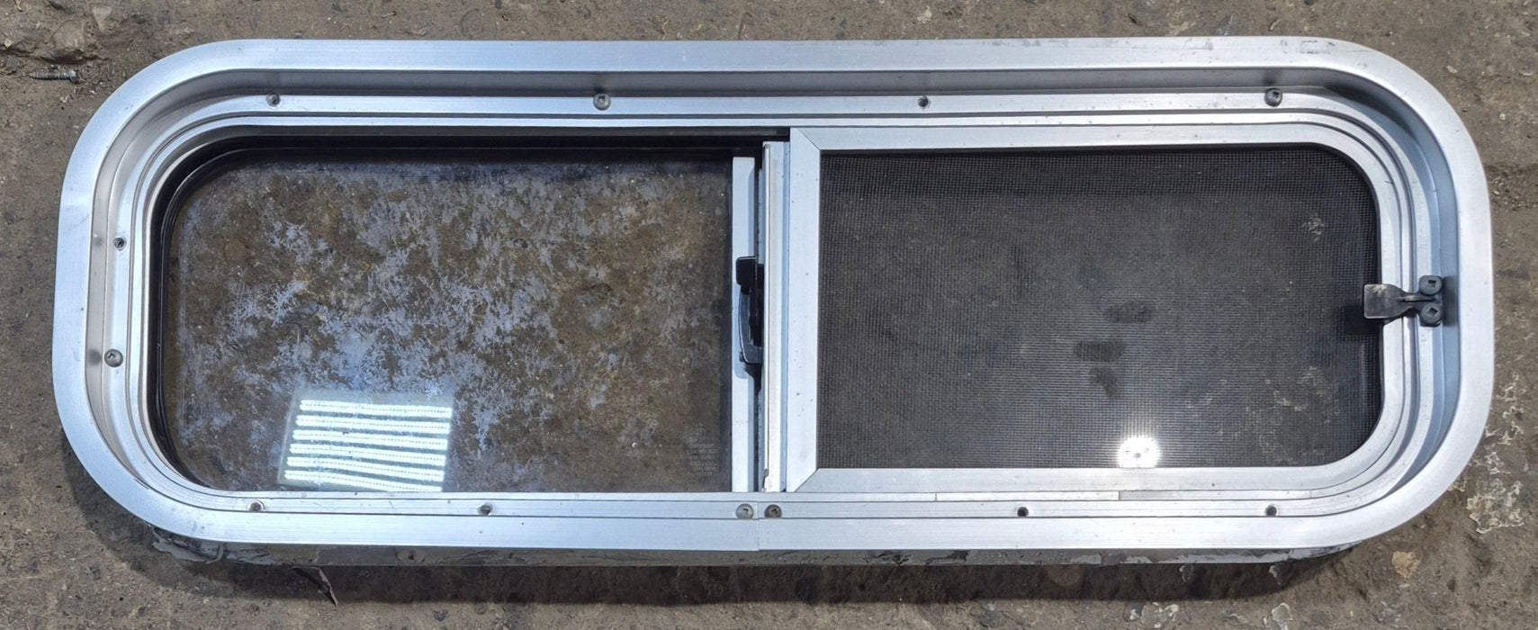 Used Silver Radius Opening Window : 26 1/2" W x 8 1/2" H x 1 3/4" D