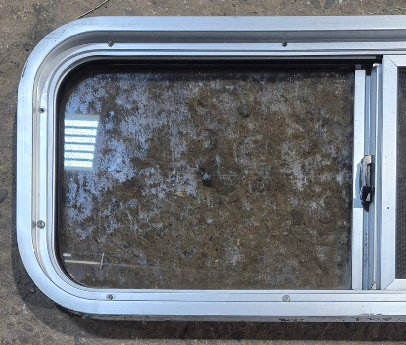 Used Silver Radius Opening Window : 30" W x 11 1/2" H x 1 3/4" D