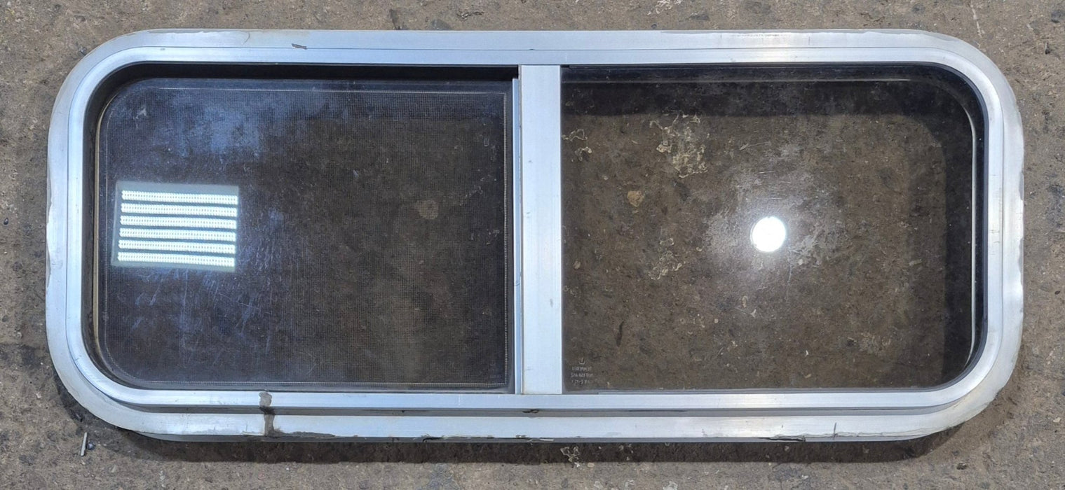 Used Silver Radius Opening Window : 30" W x 11 1/2" H x 1 3/4" D