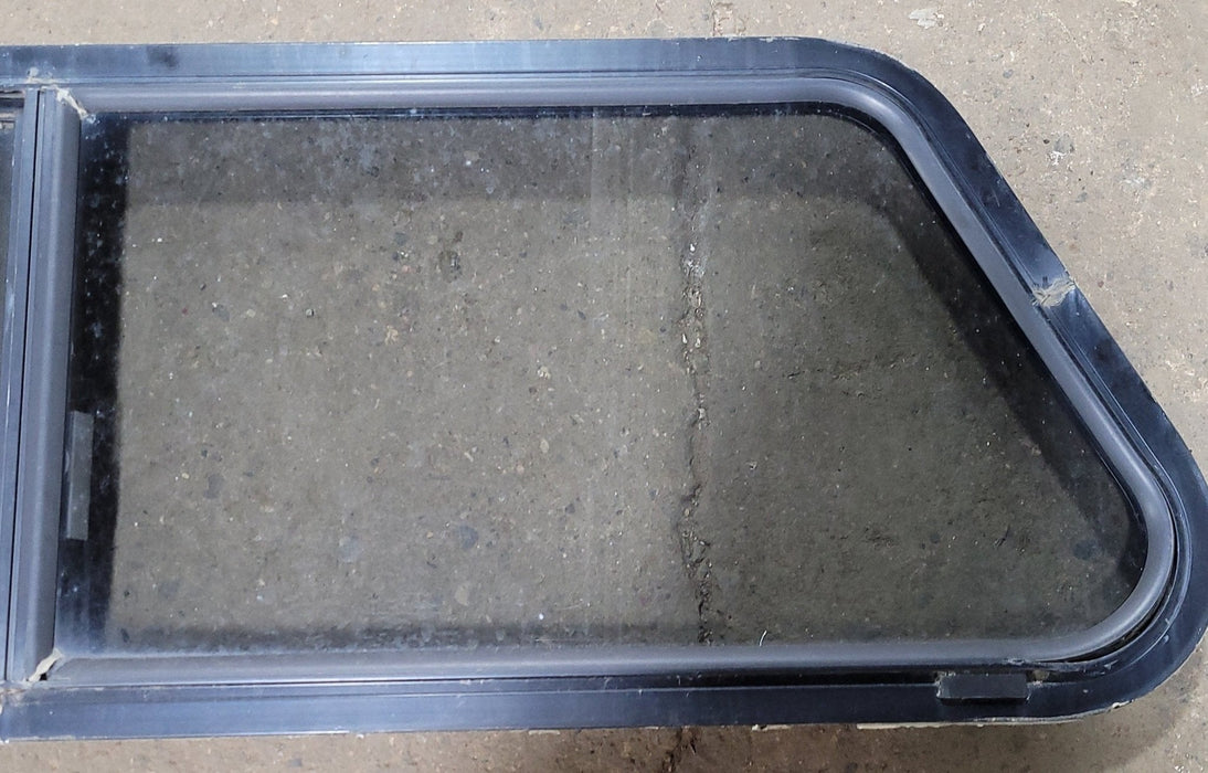 Used Slanted Black Radius Opening Window : 15 1/4" H X 48" W X 2" D - Young Farts RV Parts