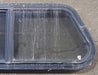 Used Slanted Black Radius Opening Window : 30 1/4" W X 11 3/4" H X 1 7/8" D - Young Farts RV Parts