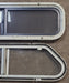 Used Slanted Black Radius Opening Window : 32" W x 8 1/2" H x 1 3/8" D - Young Farts RV Parts