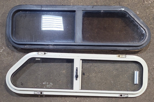 Used Slanted Black Radius Opening Window : 32" W x 8 1/2" H x 1 3/8" D - Young Farts RV Parts