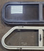 Used Slanted Black Radius Opening Window : 32" W x 8 1/2" H x 1 3/8" D - Young Farts RV Parts
