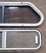 Used Slanted Black Radius Opening Window : 32" W x 8 1/2" H x 1 3/8" D - Young Farts RV Parts