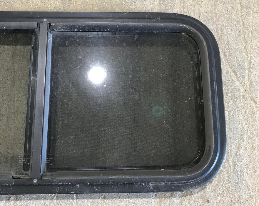 Used Slanted Black Radius Opening Window : 36 3/4" W x 13 1/2" H x 2" D - Young Farts RV Parts