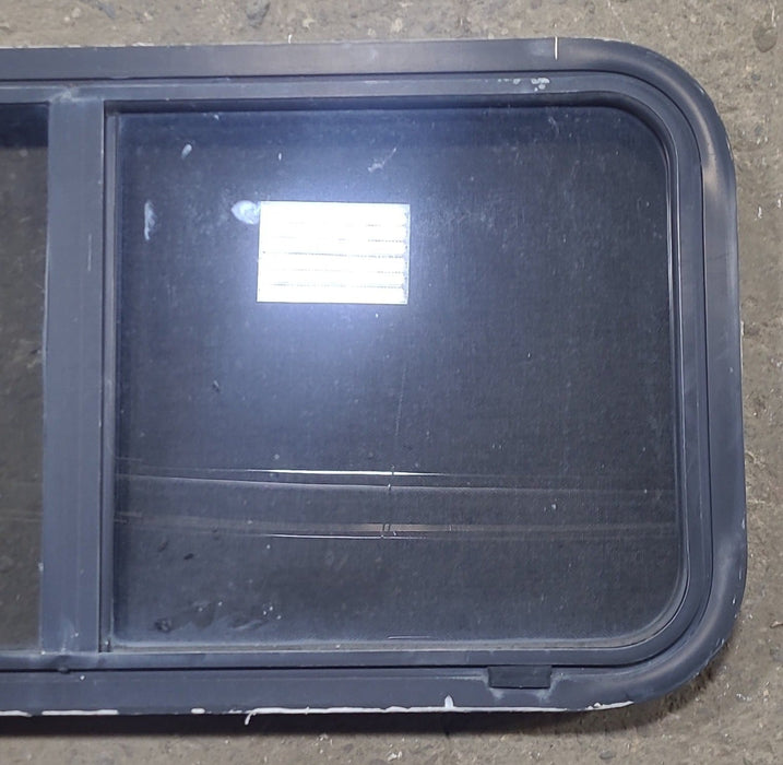 Used Slanted Black Radius Opening Window : 41 3/4" W x 17 3/4" H x 1 7/8" D - Young Farts RV Parts