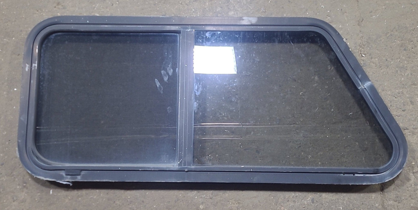 Used Slanted Black Radius Opening Window : 41 3/4" W x 17 3/4" H x 1 7/8" D - Young Farts RV Parts