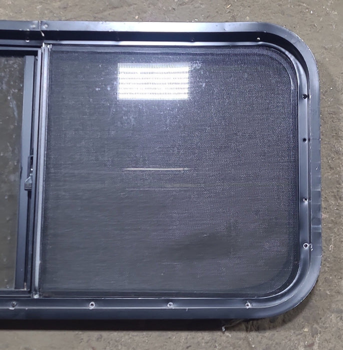 Used Slanted Black Radius Opening Window : 41 3/4" W x 17 3/4" H x 1 7/8" D - Young Farts RV Parts