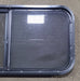 Used Slanted Black Radius Opening Window : 41 3/4" W x 17 3/4" H x 1 7/8" D - Young Farts RV Parts